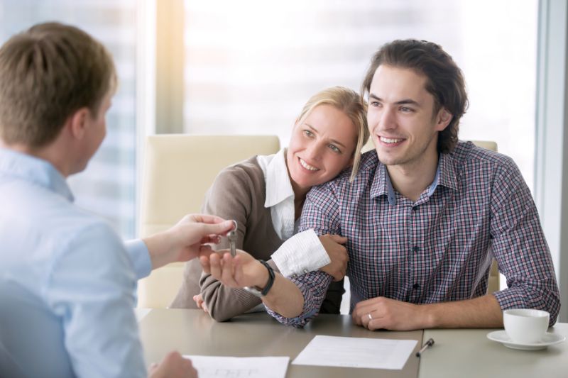 Couple receiving a key