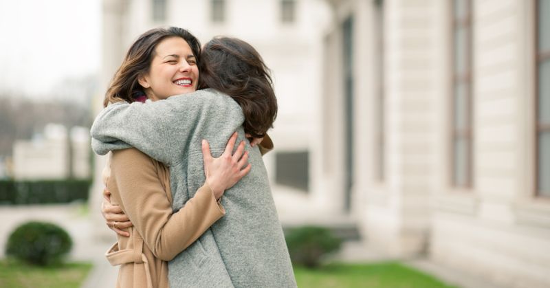 Two women hugging