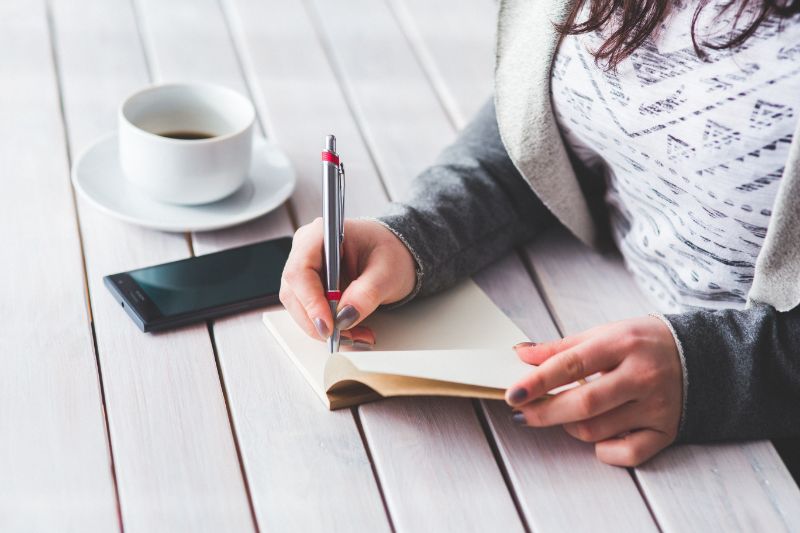 Woman writing something (1)